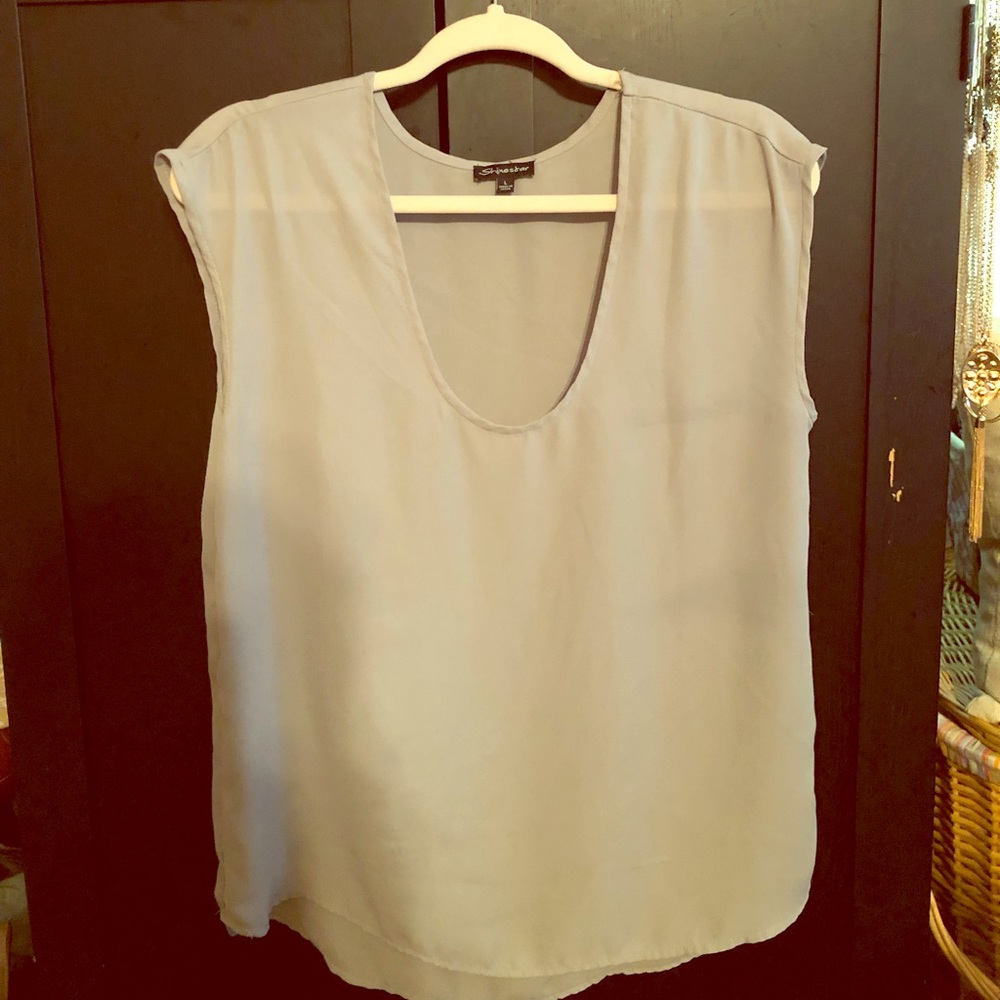 Grey sleeveless blouse